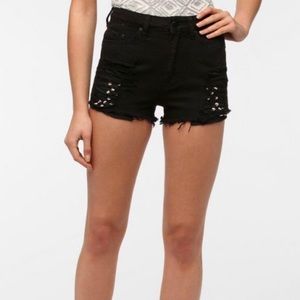 High rise black shorts with studs cheeky